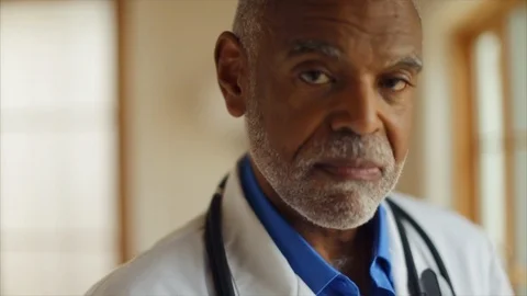 Senior doctor smiling. 스톡 동영상 88405741
