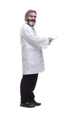 Senior doctor using a digital tablet. isolated on a white Stock Photos