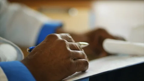 Senior doctor writing notes. Stock-Footage 88405758