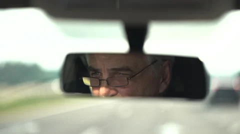 Senior driving a car Video stock 64757694