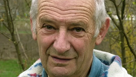 Senior elderly aged old man portrait outdoors Stock Footage 69984192