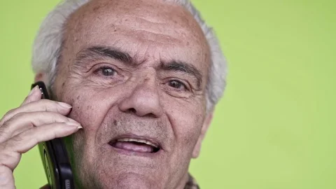 Senior Elderly Happy Man talking on smartphone, Close up Slow Motion Video Video stock 105973268