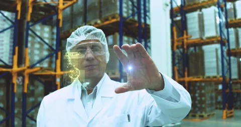 Senior engineer using futuristic tablet. Stock Footage 150017813