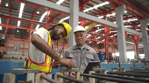 Senior engineers and young man workers are talking 스톡 동영상 317904871