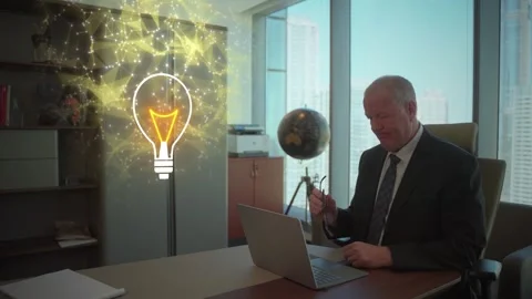 Senior executive businessman in an office develops a great idea Video stock 308357499