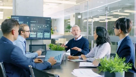 Senior Executive Explains Company's Vision and Potential to His Employees. Stock Footage