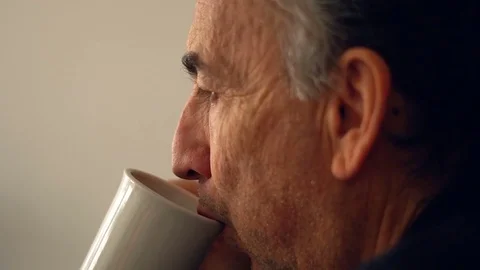 Senior Gentleman Having Breakfast &amp; Drinking Coffee At Home Stock Footage 78545452