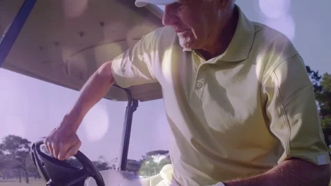 Senior golfer heading to cart adjusting knob donning glove readying drive with Stockbeeldmateriaal 334694116
