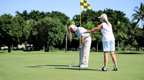 Senior Golfing Couple Stock Footage