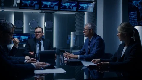 Senior Government Member Holds an Impromptu Meeting with His Team of Advisors Stock Footage