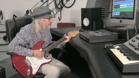 Senior guy recording guitar. Stock Footage 113483499