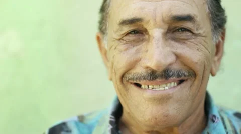 Senior hispanic man smiling at camera Stock Footage