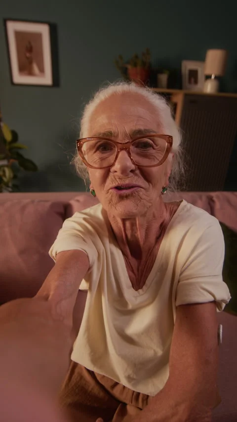 Senior Lady with Diabetes Arm Patch Chatting on Video Call Stock Footage 320972522