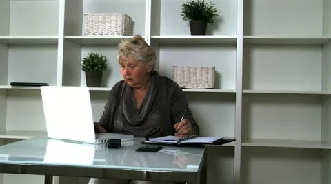 Senior lady on laptop Stock Footage 10833769