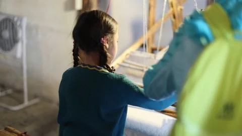 Senior Lady. Sat down spinning wool Stock Footage 97621671