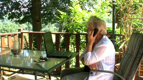 Senior lady working from home Stock Footage 470388