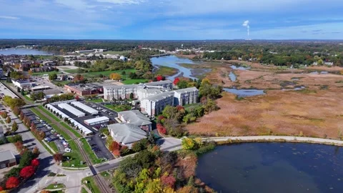 Senior living apartment complex overlooking the Macatawa river in Holland Stock Footage 341022791