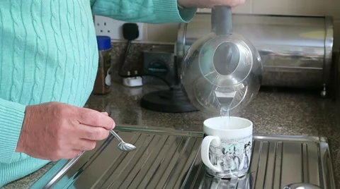 Senior making coffee Stock Footage 53580823