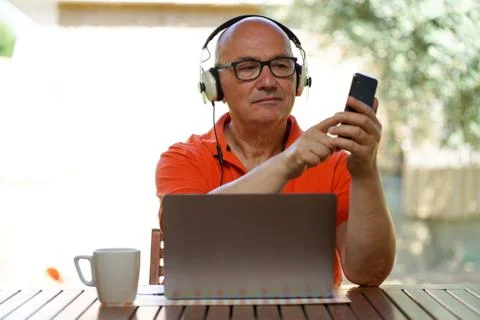 Senior Male working at home Stock Photos