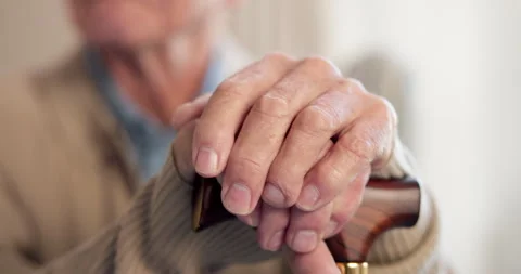 Senior, man and hands with cane in retirement home for mobility, assistance or Stock Footage 340608641