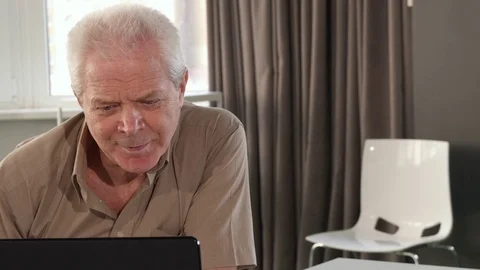 Senior man asking advice from his grandson Stock Footage 73902010