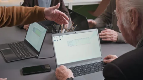 Senior Man Asking Questions in Computer Literacy Class Stock Footage 333705264