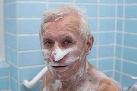 Senior man bathing Stock Photos