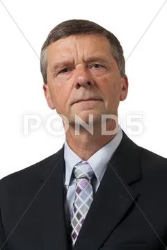 Senior man in blue shirt looks pensive Stock Photos