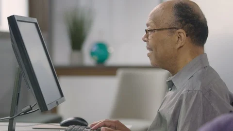 Senior man browsing the internet Stock Footage 106794036