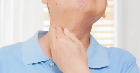 Senior man check thyroid gland Stock Footage 244328042