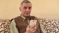 Senior man communicates through a smartphone. Man with mobile phone HD Footage