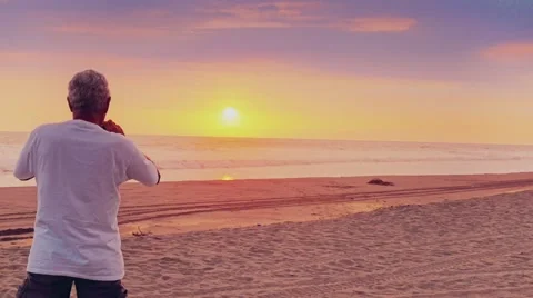 Senior man contemplating sunset Stock Footage 59948543