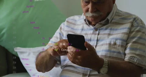 Senior man cradling smartphone on bed tapping and activating code overlays while Stock Footage 329533751