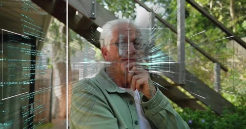 Senior man on deck, tracking HUD boxes appearing and exploring live code, Stock Footage 321715883