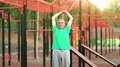 Senior man doing physical exercise on sports ground HD Footage