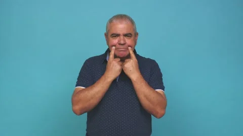 Senior man doubting between two options Stock Footage 144217750