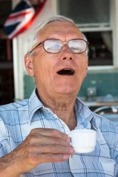 Senior man drinking coffee Stock Photos