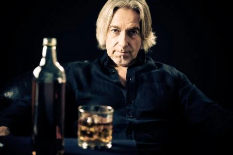 Senior Man Drinking Hard 写真素材