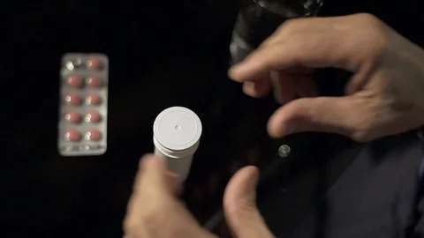 Senior man drinking pills Video stock 104546830