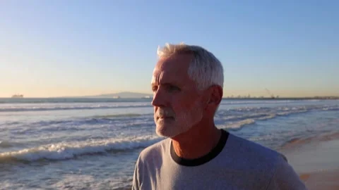 Senior Man Exercising At The  Beach 動画素材 145452667