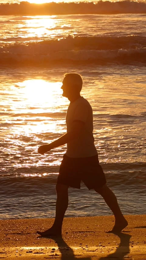 Senior Man Exercising At The  Beach. Vertical Video. Stock-Footage 312004669