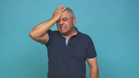 Senior man forgetting something, slapping forehead with palm and closing eyes Stock Footage 144217608