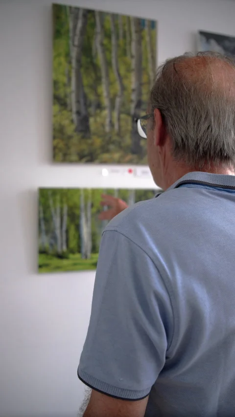 Senior Man Gestures at Birch Tree Painting Stock Footage 346269168