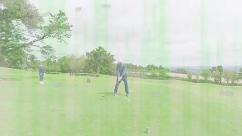 Senior man golfer aligning swinging driving ball for fun retrieving ball partner Stock Footage 333924911