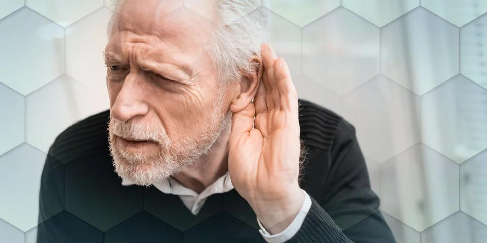 Senior man with hearing problems, geometric pattern Stock Photos