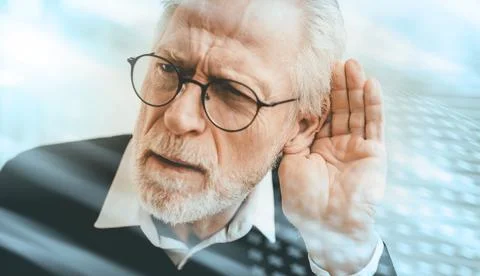 Senior man with hearing problems; light effect Stock-Fotos