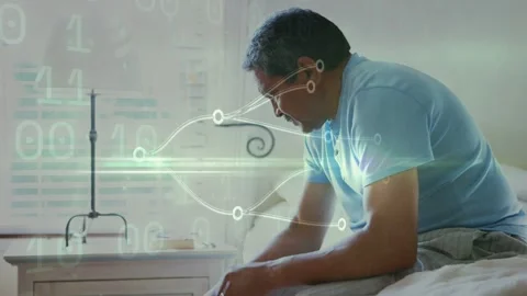 Senior man hiding face lowering hands and sitting up while data overlay Stock Footage 334338104
