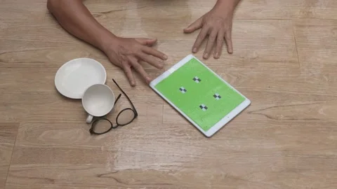 Senior man hold greenscreen tablet is falling because hypertension Stock Footage 156966873