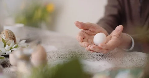 Senior Man Holding Easter Eggs in Hands Video stock 126790469