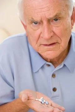 Senior Man Holding Prescription Drugs Stock Photos